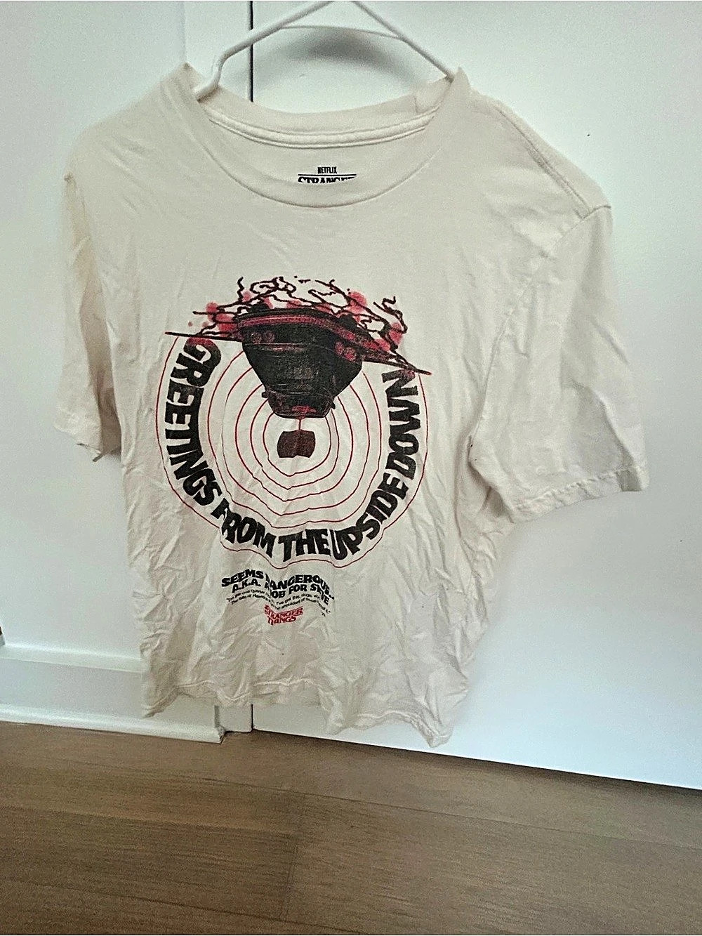 Uniqlo Stranger Things graphic tee Graphic Tee in Cream Size Medium